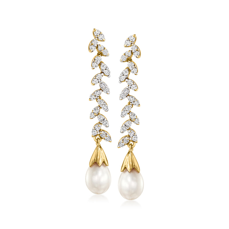 Two-tone gold drop earrings with diamond accents and cultured pearl teardrops, post back