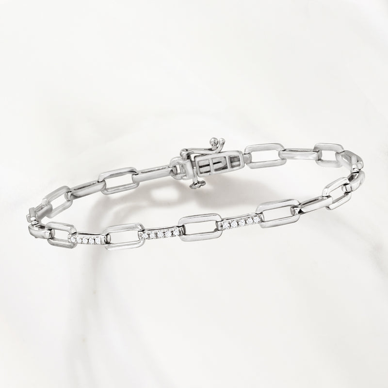 Sterling silver bracelet shown from side with diamond bar center and box clasp