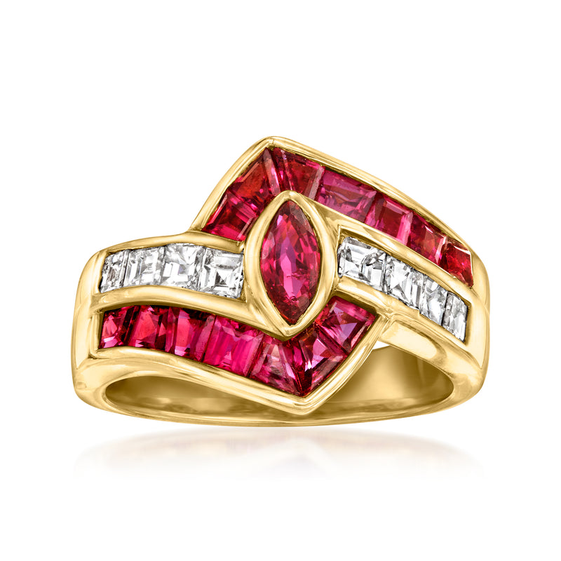 18kt yellow gold ring with oval ruby center and baguette diamond side stones