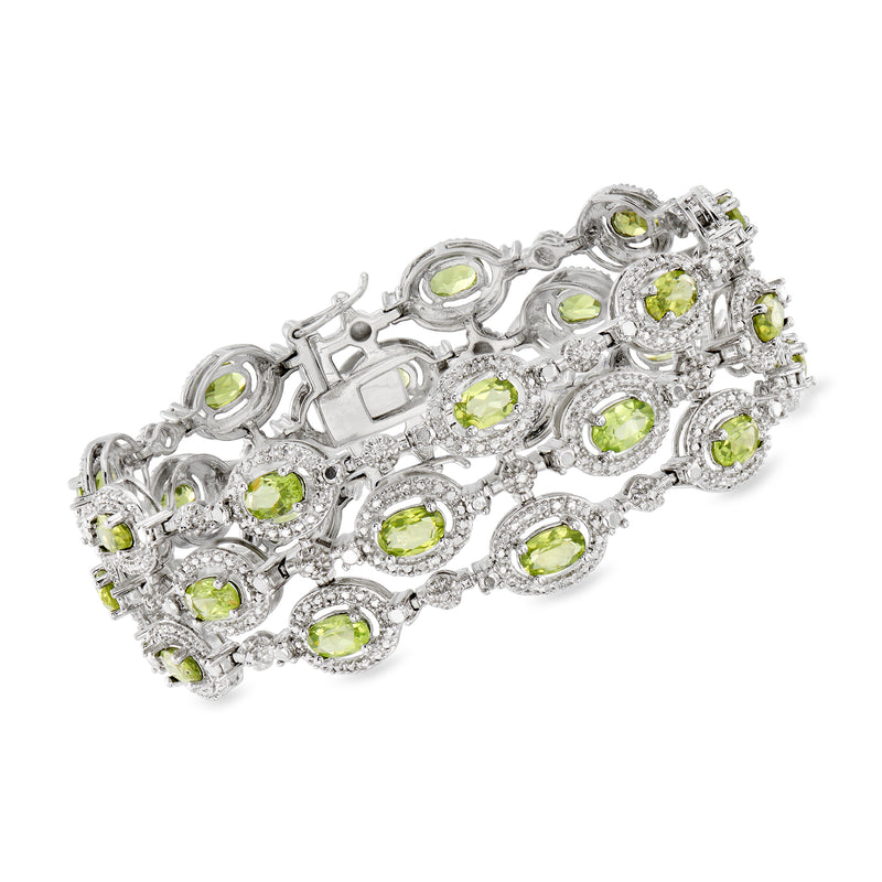 Sterling silver three-row bracelet with oval peridot gemstones and diamond accents