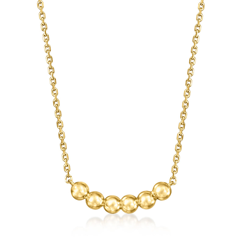 14kt yellow gold curved bead necklace with round bead links along a chain
