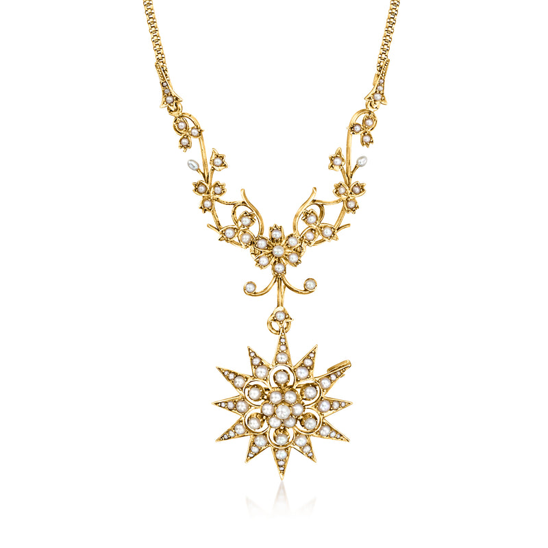 Vintage pearl starburst pendant necklace in yellow gold with delicate petal-like prongs