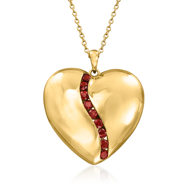 Gold heart pendant necklace with red garnet inlay on a chain