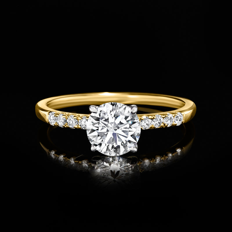Lab-grown diamond ring in 14kt yellow gold with round center stone and pavé shoulders
