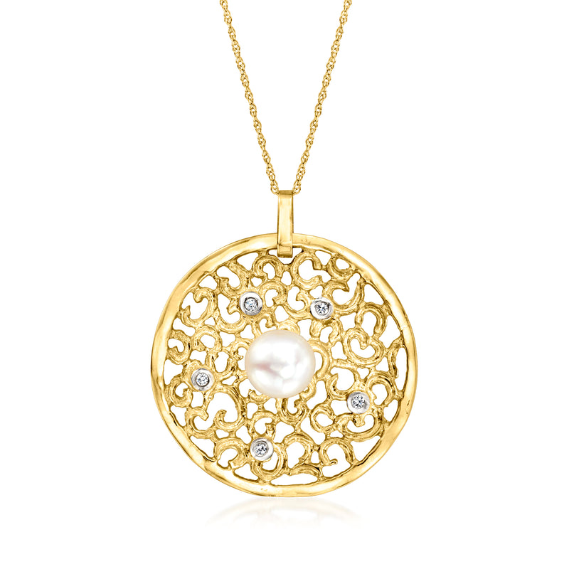 14kt yellow gold pendant necklace with round openwork medallion, pearl center, diamond accents