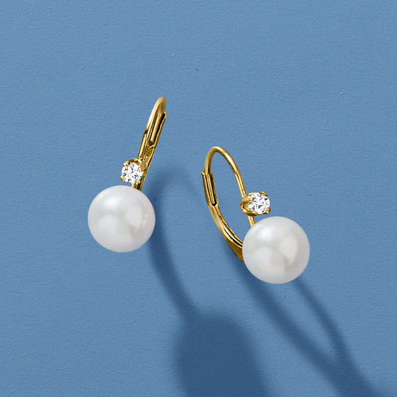 Cultured pearl drop earrings with round diamond accents and hinged leverback, yellow gold