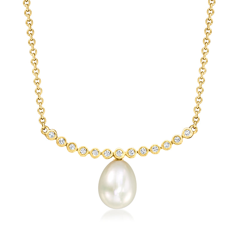 14kt yellow gold pearl necklace with round diamond stations and a teardrop cultured pearl