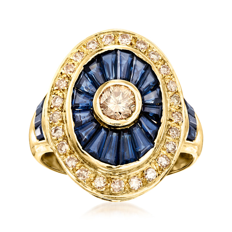18kt yellow gold ring with blue sapphire center and diamond halo