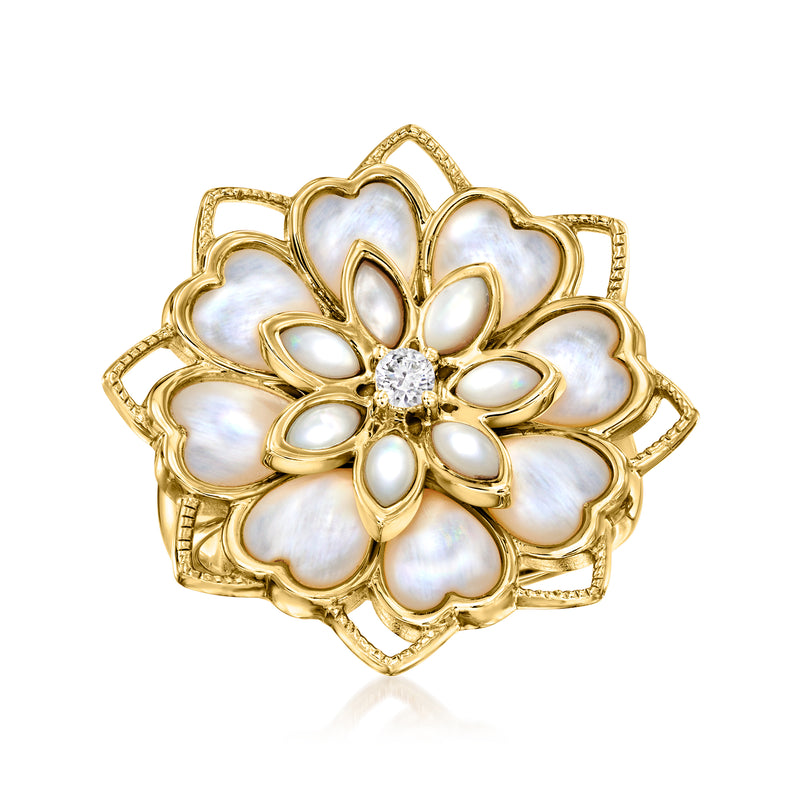 Gold flower ring with mother-of-pearl petals and a small clear center stone