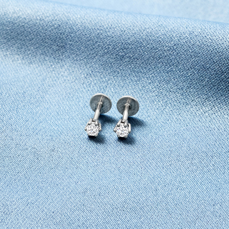 Sterling silver round diamond stud earrings with flat backs.