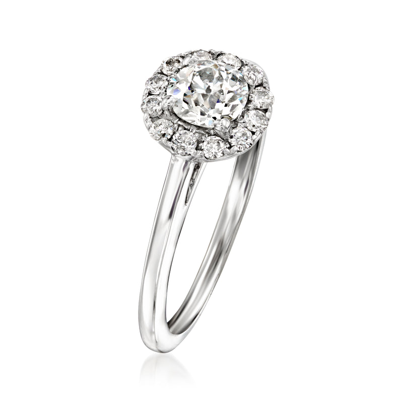 18kt white gold diamond ring with round halo and prong-set center diamond