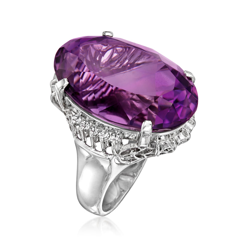 Vintage platinum ring with oval purple amethyst and diamond accents
