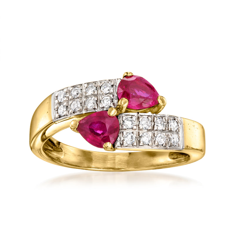 Vintage 18kt yellow gold bypass ring with two rubies and diamond pavé