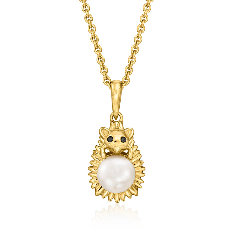 Gold hedgehog pendant necklace with white cultured pearl and black spinel eyes