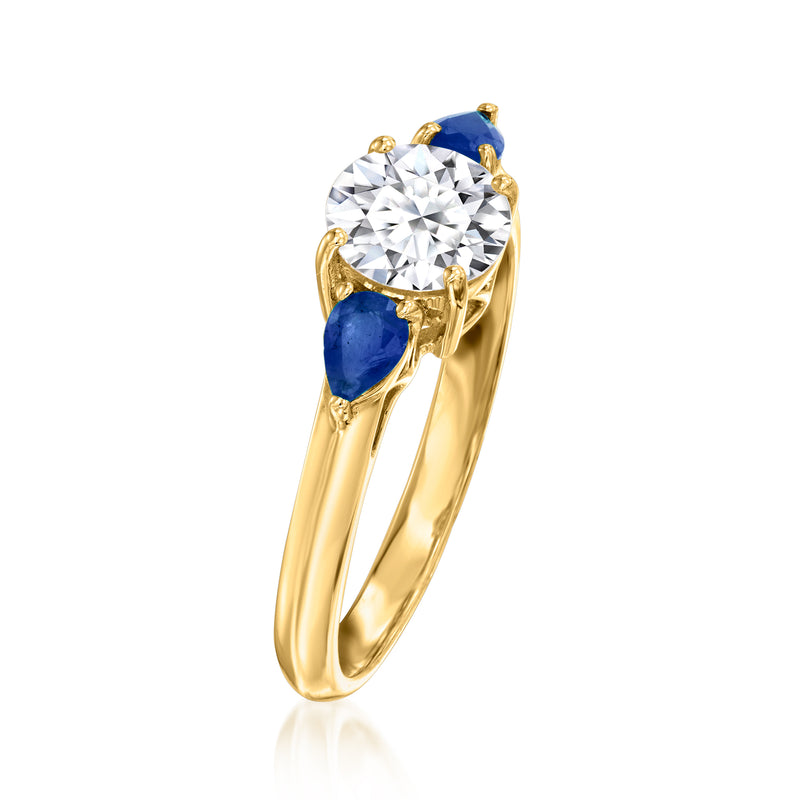 14kt yellow gold ring with raised round diamond and blue sapphire detail