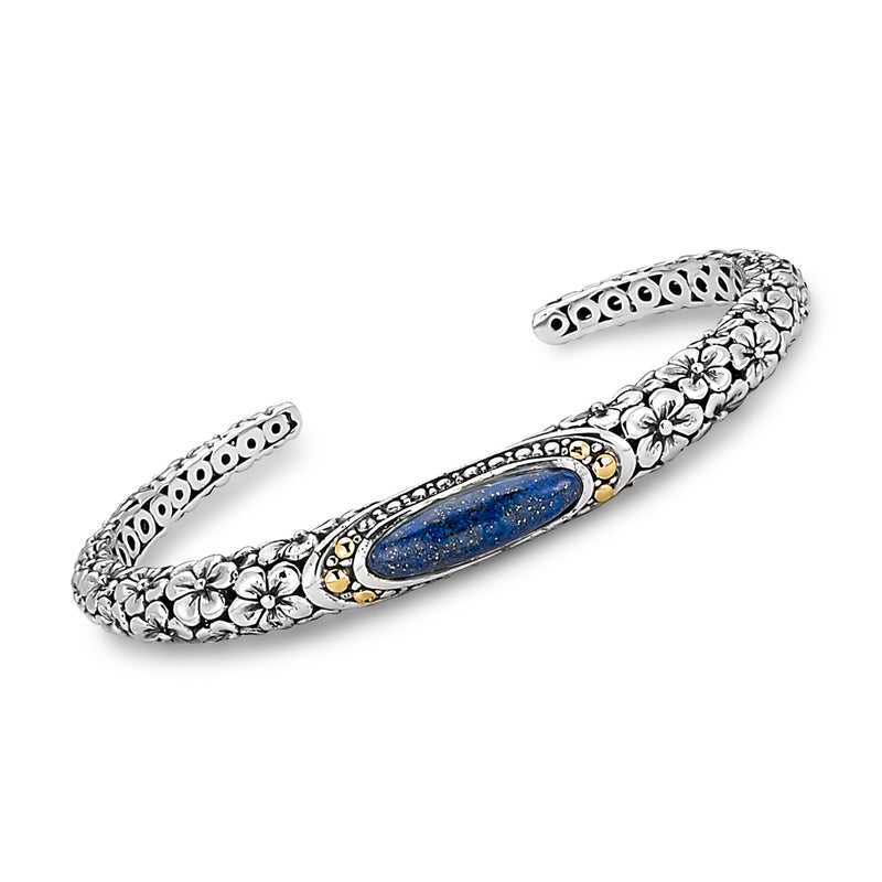 Sterling silver floral cuff bracelet with blue lapis oval stone and gold accents