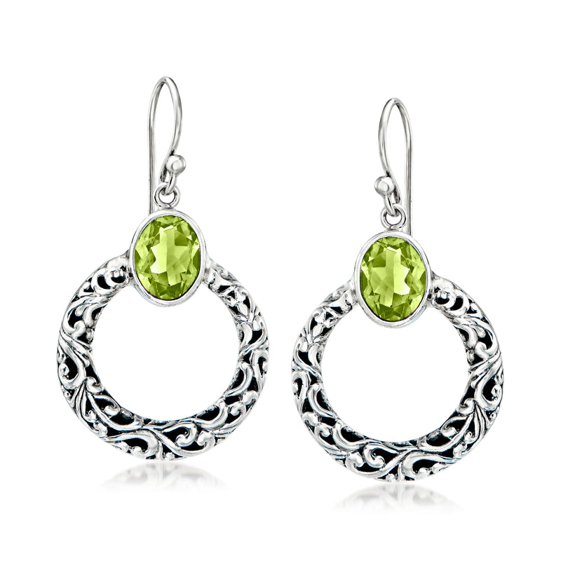 Sterling silver peridot circle drop earrings with ornate filigree and green oval stone