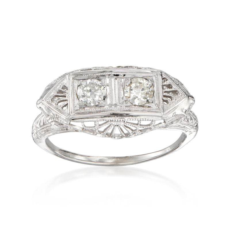 Vintage 18kt white gold filigree diamond ring with rectangular center stone