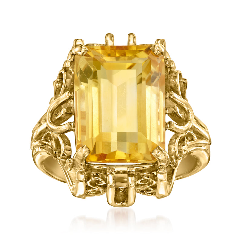 Vintage citrine ring in 18kt yellow gold with large rectangular gemstone, ornate side settings