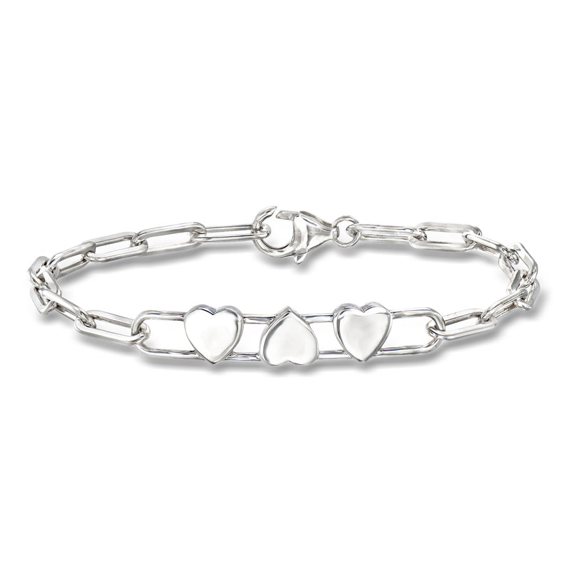 Sterling silver link bracelet with three small heart charms and secure clasp