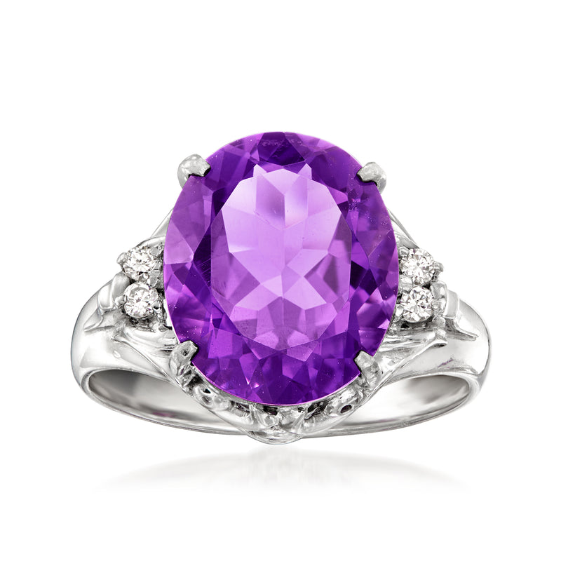 Vintage amethyst oval ring in platinum with small diamond accents around the setting