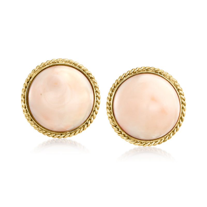 Round pink coral cabochon clip-on earrings in 14kt yellow gold