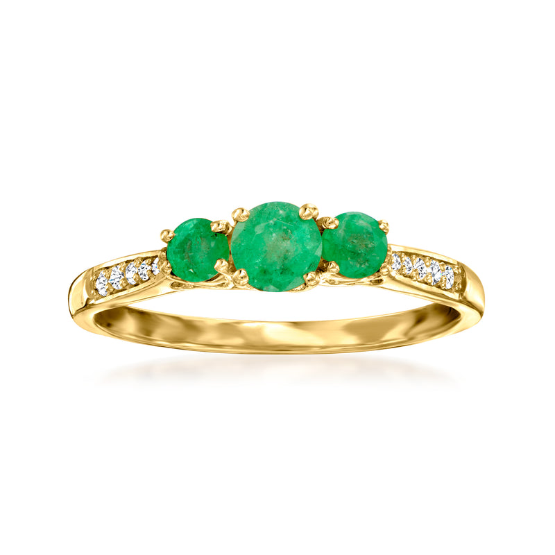 14k yellow gold three-stone emerald ring with green stones and diamond accents