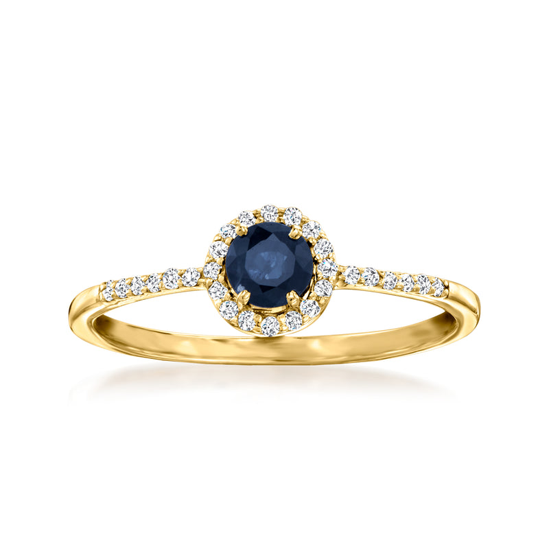 14kt yellow gold sapphire ring with round blue center stone and diamond halo