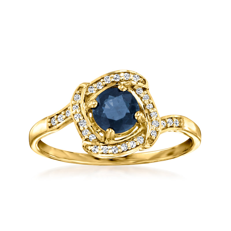 14kt yellow gold ring with oval blue sapphire center and diamond halo