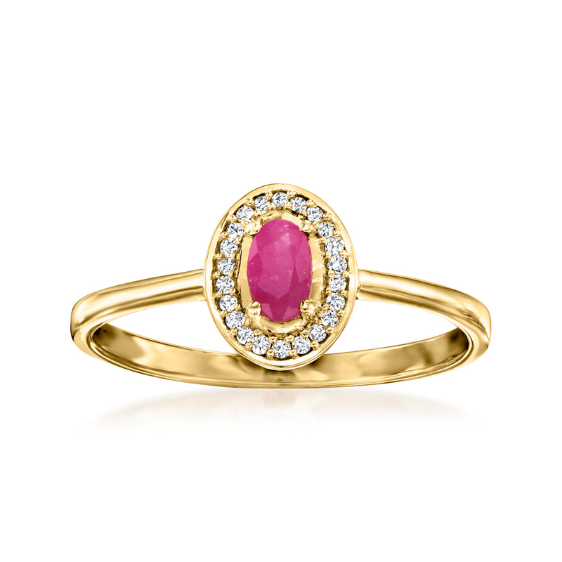 14kt yellow gold ring with oval ruby center and diamond halo accents