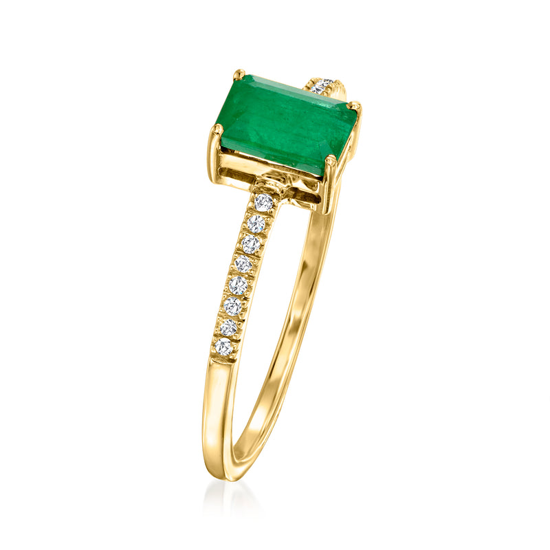 Side view of 14kt yellow gold emerald ring with green square center and diamond accents