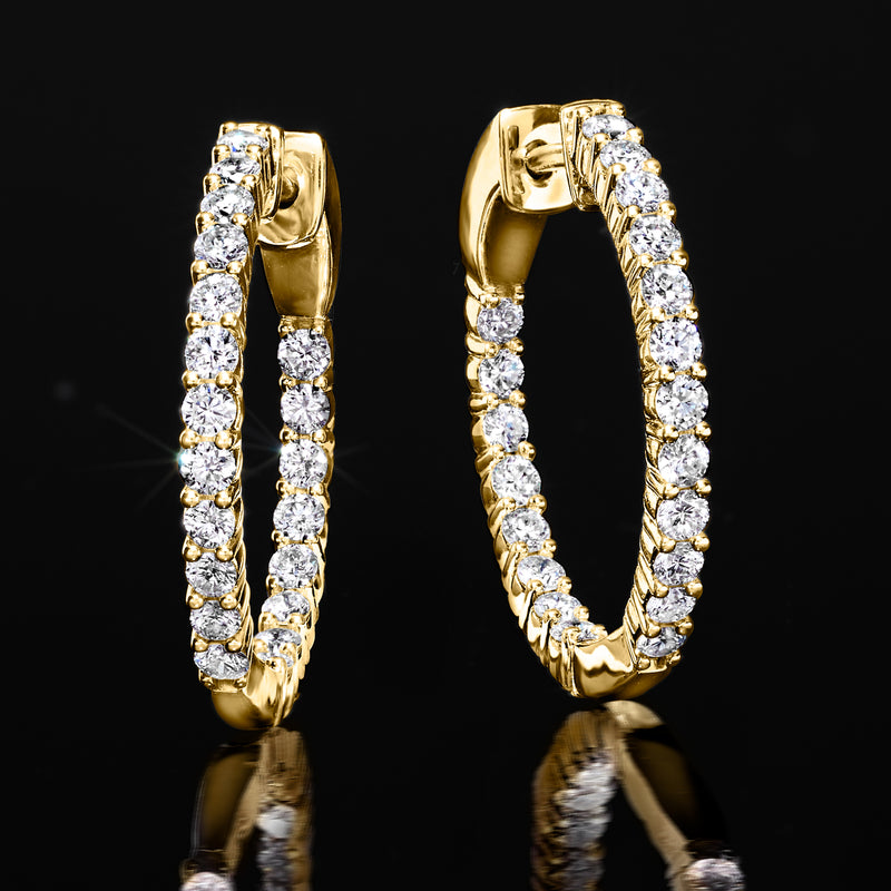 Gold hoop earrings with round lab-grown diamonds inside and out