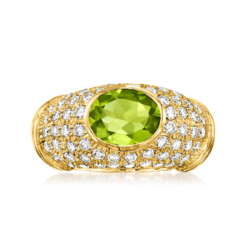 18k yellow gold dome ring with large green peridot center and diamond border
