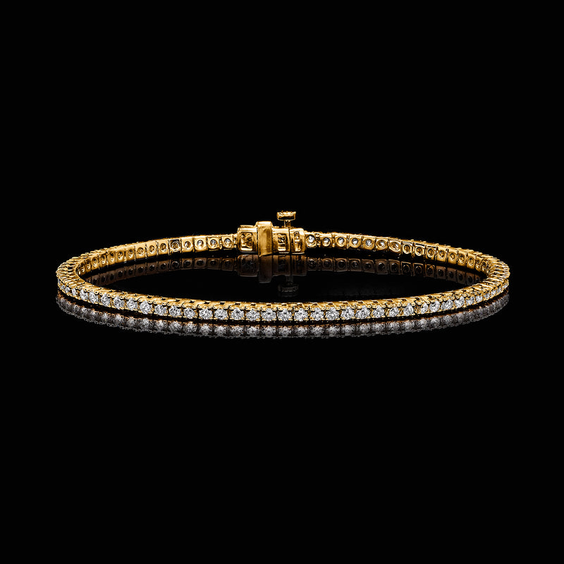 18kt gold over sterling tennis bracelet with round diamond-like stones and box clasp.