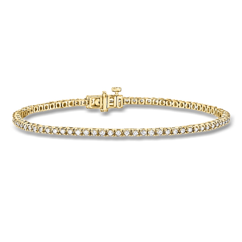 Gold tennis bracelet with round diamond-like stones and box clasp