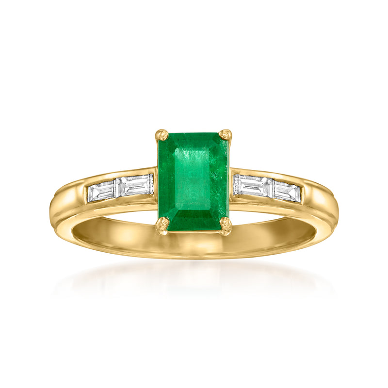 14kt yellow gold ring with emerald-cut green center stone and baguette diamond sides