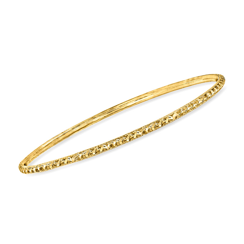 22kt yellow gold bangle bracelet with textured center row, polished outer edges