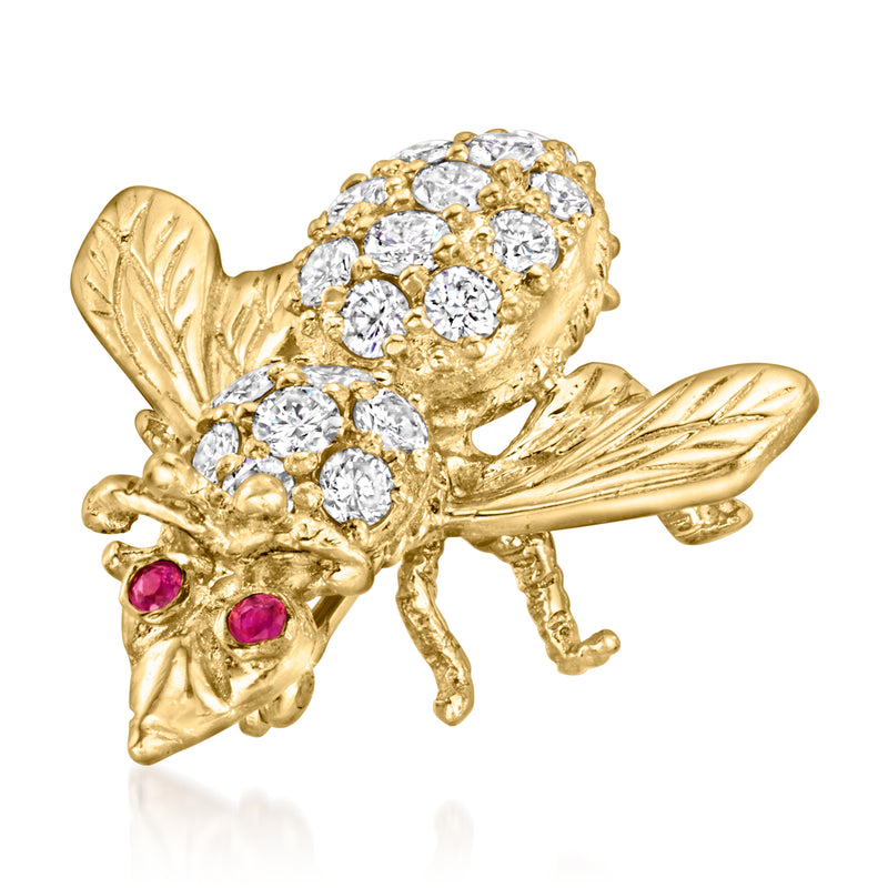 Gold bee pin with two diamond cluster wings and ruby accents