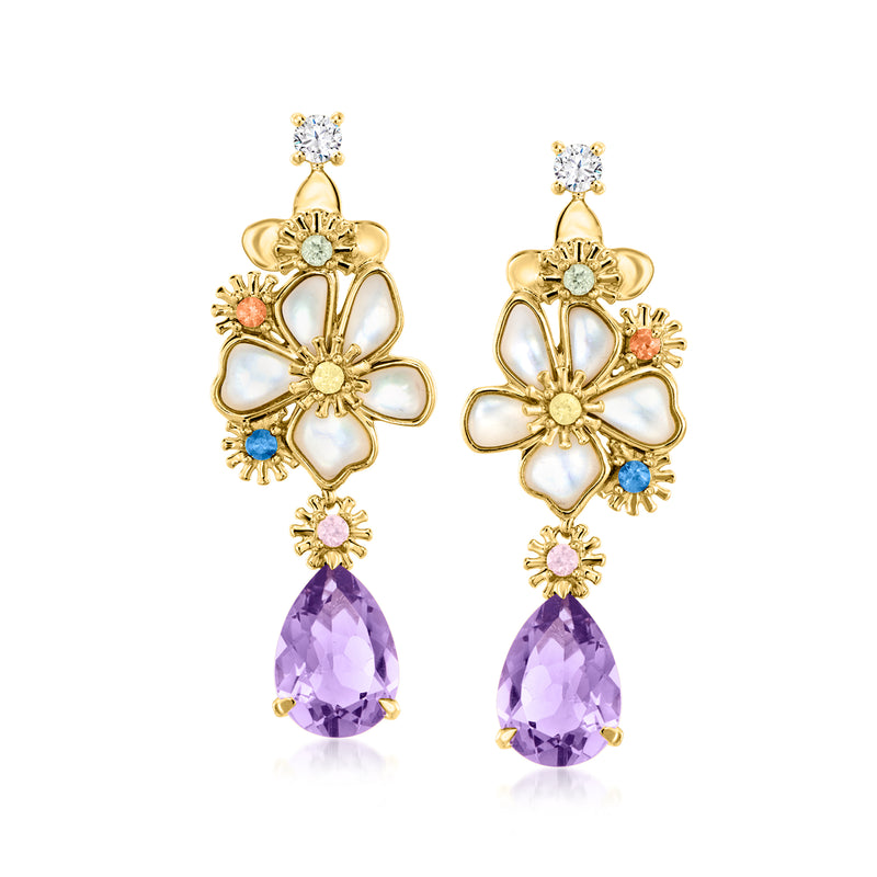 Gold-tone flower drop earrings with mother-of-pearl petals, purple teardrop stones, and gems