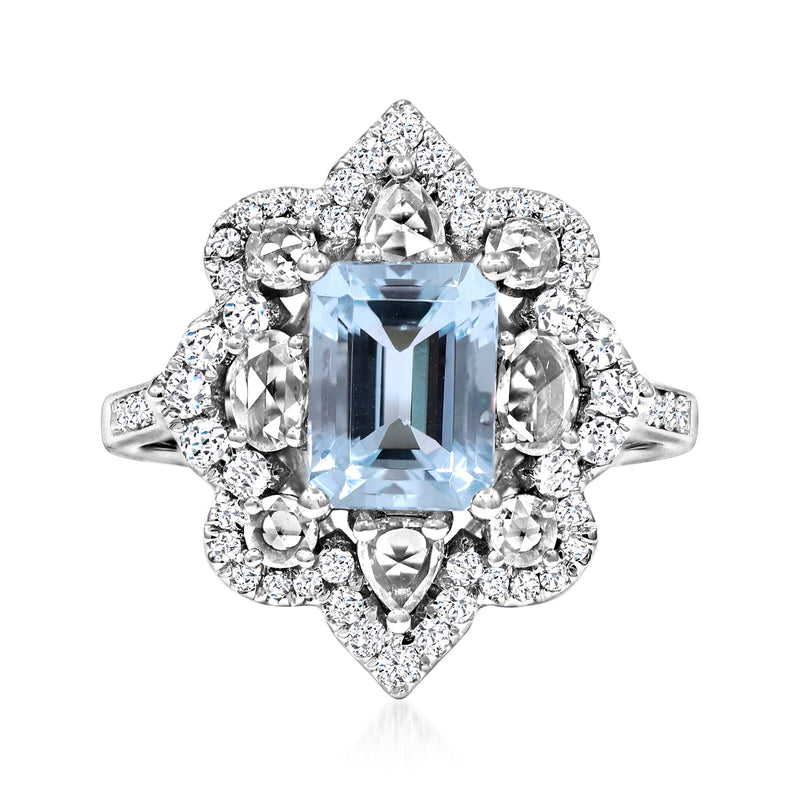 Aquamarine and diamond halo ring in 14kt white gold, emerald-cut center stone