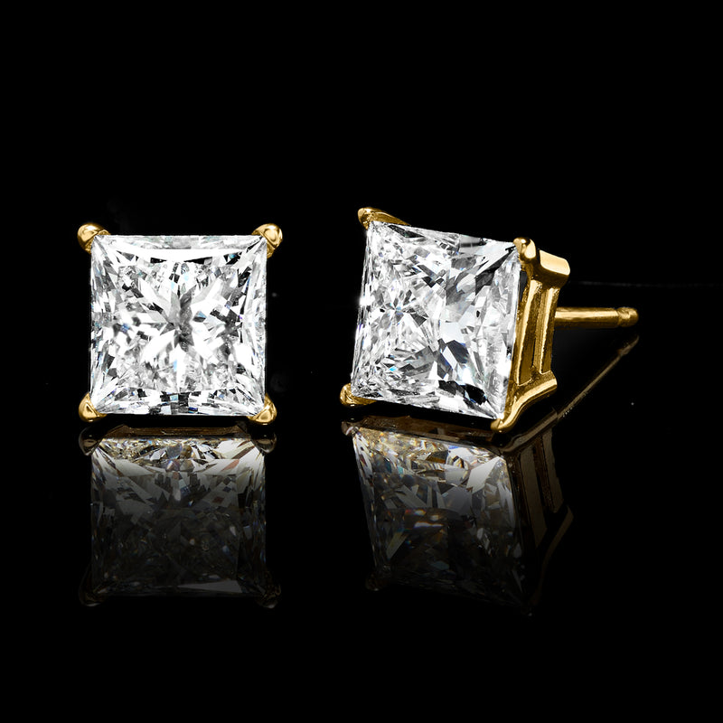 Princess-cut diamond stud earrings, square clear stones in yellow gold settings with prongs