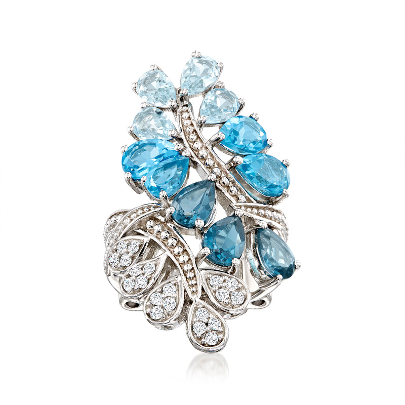 Sterling silver flower ring with blue topaz and white zircon