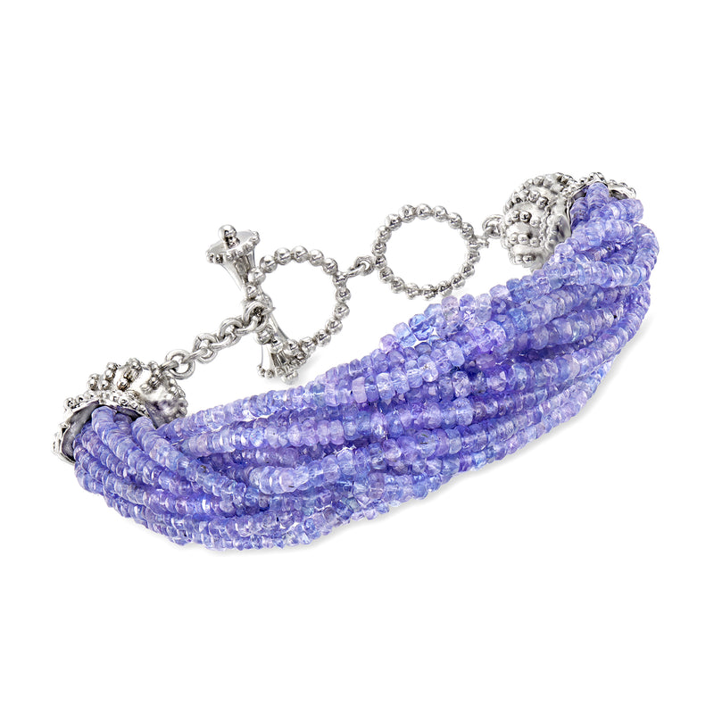 Beaded twisted bracelet with blue-purple beads and silver toggle clasp