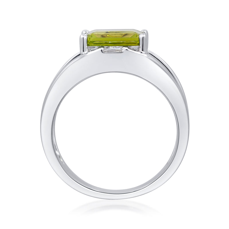 Sterling silver ring with green emerald-cut center stone in four-prong setting