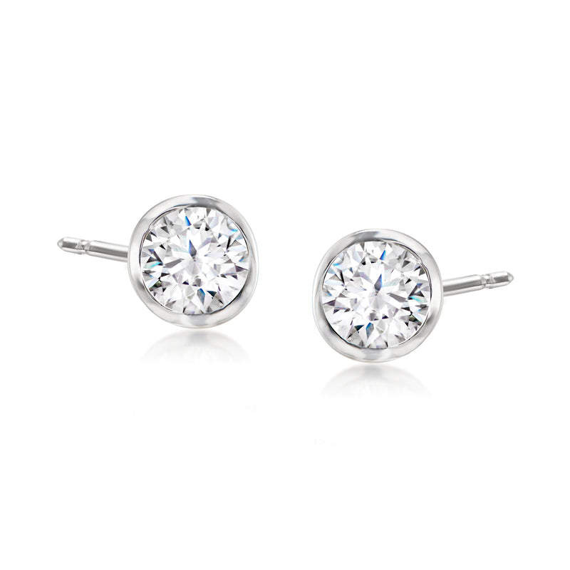 Round bezel-set diamond stud earrings in 14k white gold with push-back posts