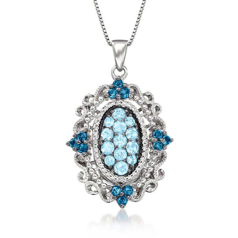 Sterling silver pendant necklace with oval blue topaz and diamond halo, teardrop accents