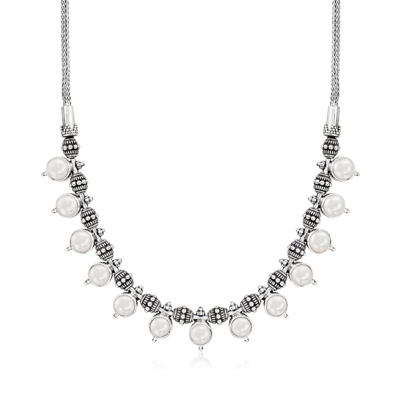 Sterling silver bali-style pearl necklace with round white cultured pearls and bead stations