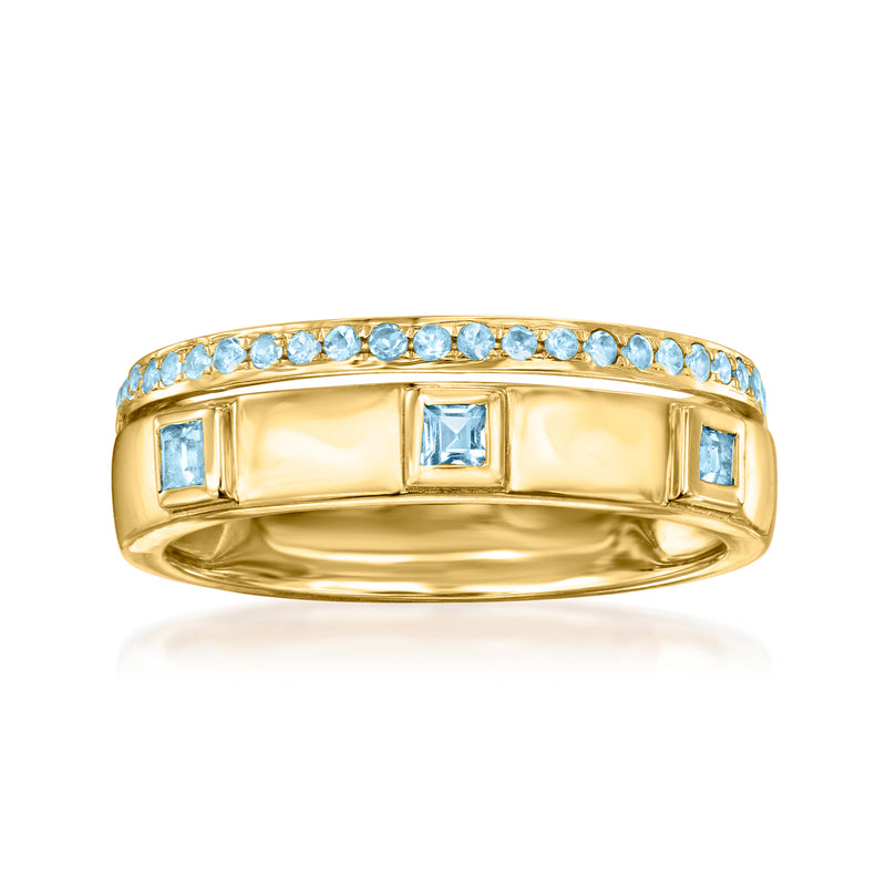 14kt yellow gold stacked-style ring with sky blue topaz gemstones across the band