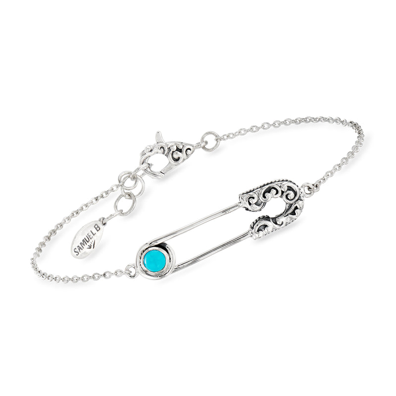 Sterling silver safety-pin bracelet with turquoise oval inlay and decorative scroll work