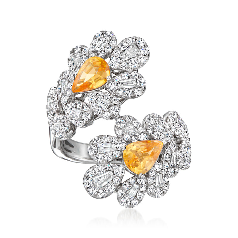 14kt white gold bypass ring with two orange pear-shaped garnets and diamond clusters